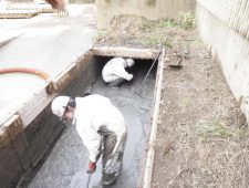 建築資材置き場の廃水ピット清掃